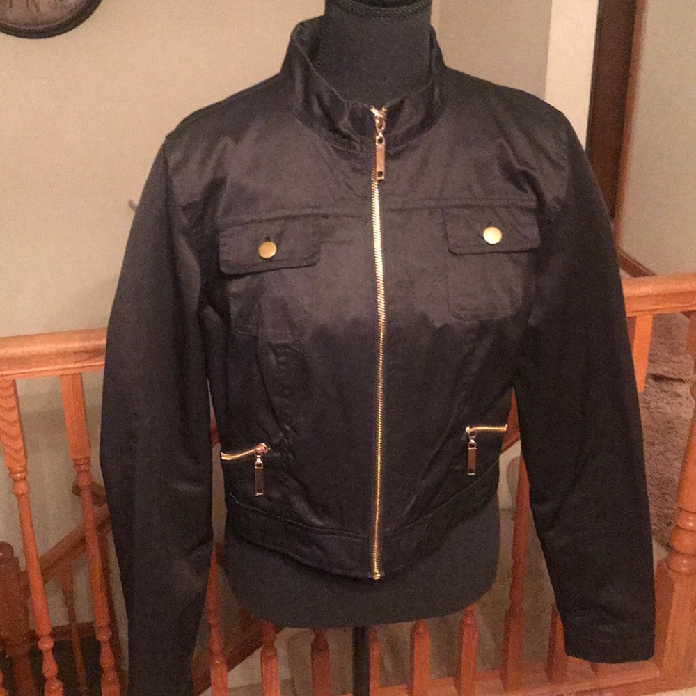 Black Jacket large but fits like a medium.